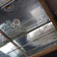 Counter or shop window in oak glass and brass France around 1920