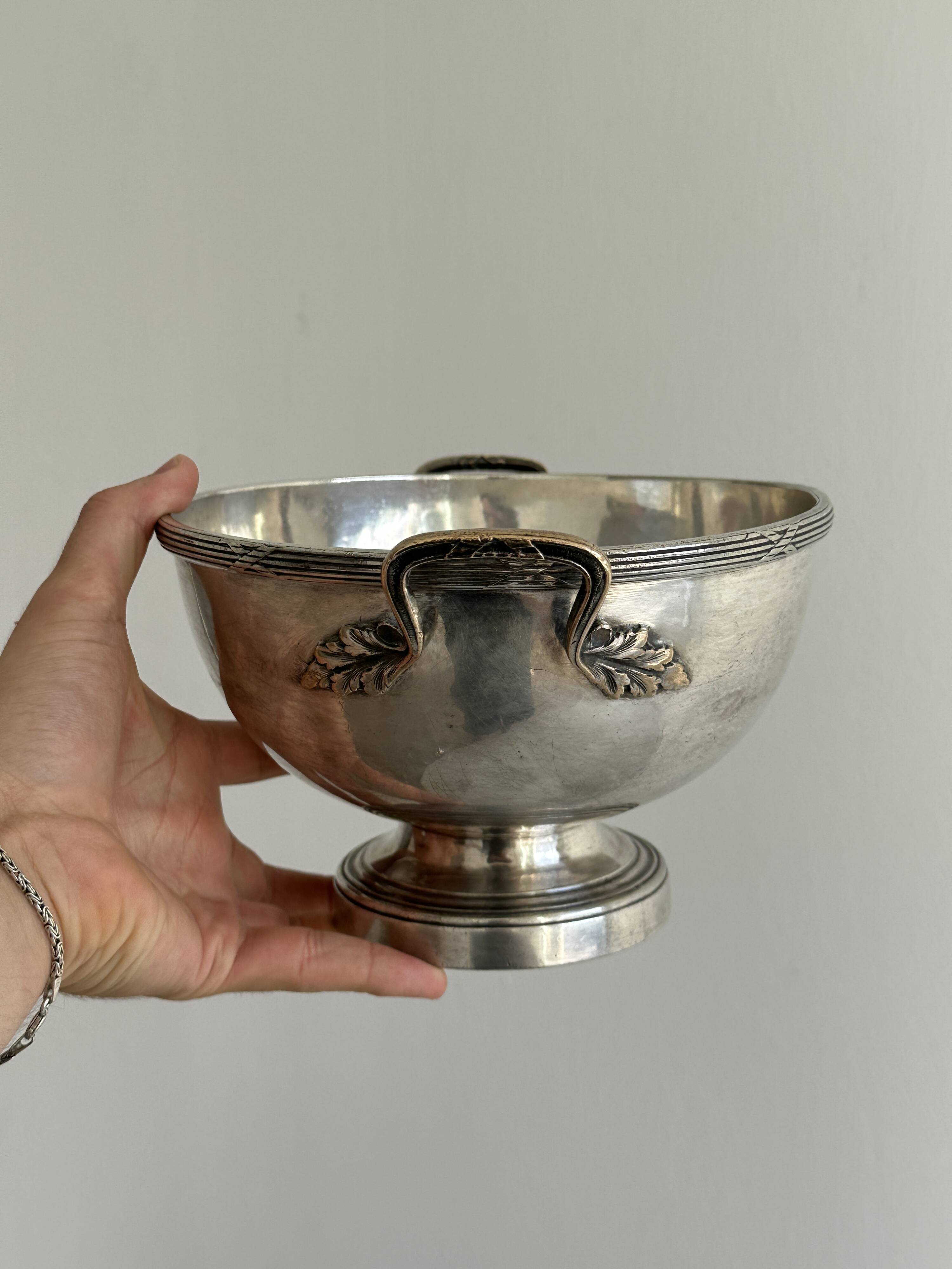 Metal salad bowl on foot