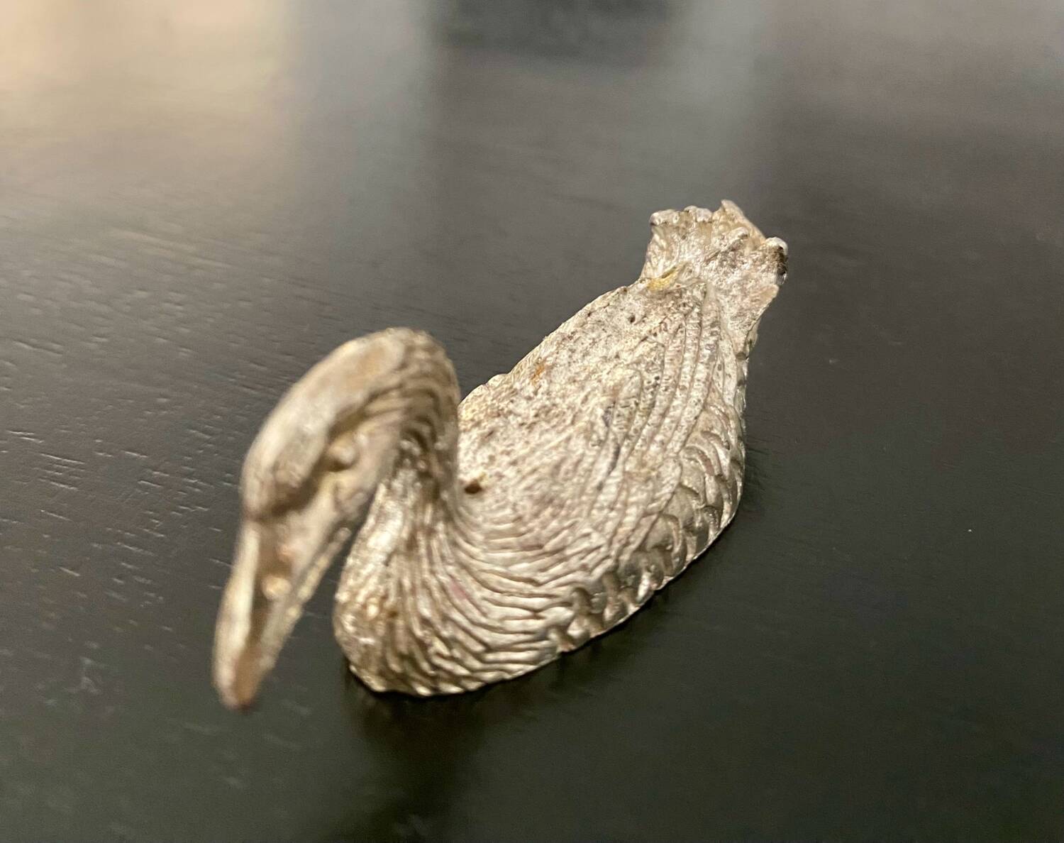 10 duck-shaped knife holders in silver-colored metal