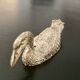 10 duck-shaped knife holders in silver-colored metal