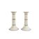Pair of porcelain candlesticks with a gold pattern.