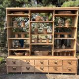 Large antique workshop furniture with drawers and shelves.