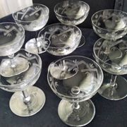 8 vintage champagne coupes with engraved decoration