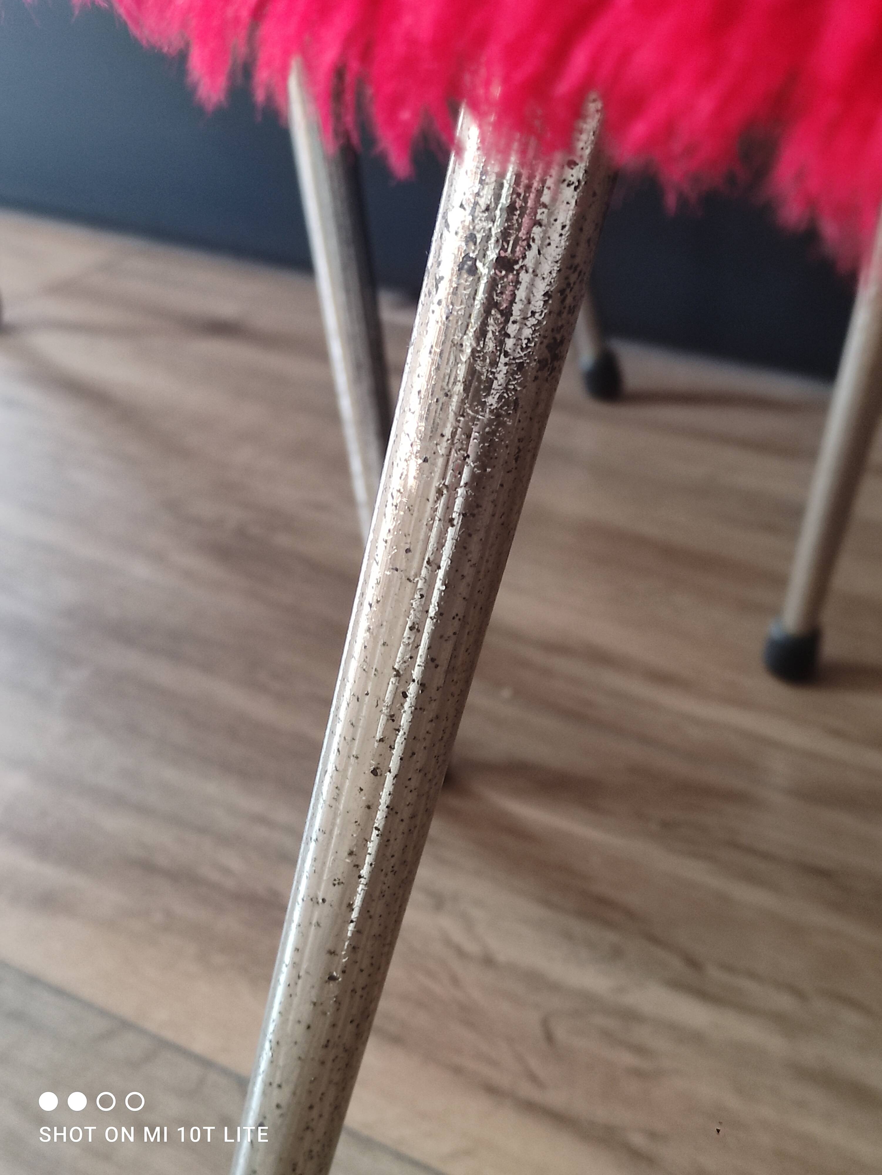 Pair of authentic cardinal red moumoute chairs from the 60s