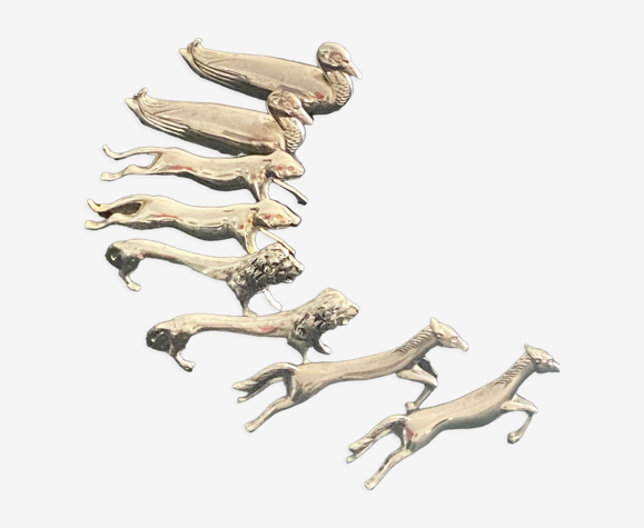 8 porte-couteaux animaux divers en métal argenté