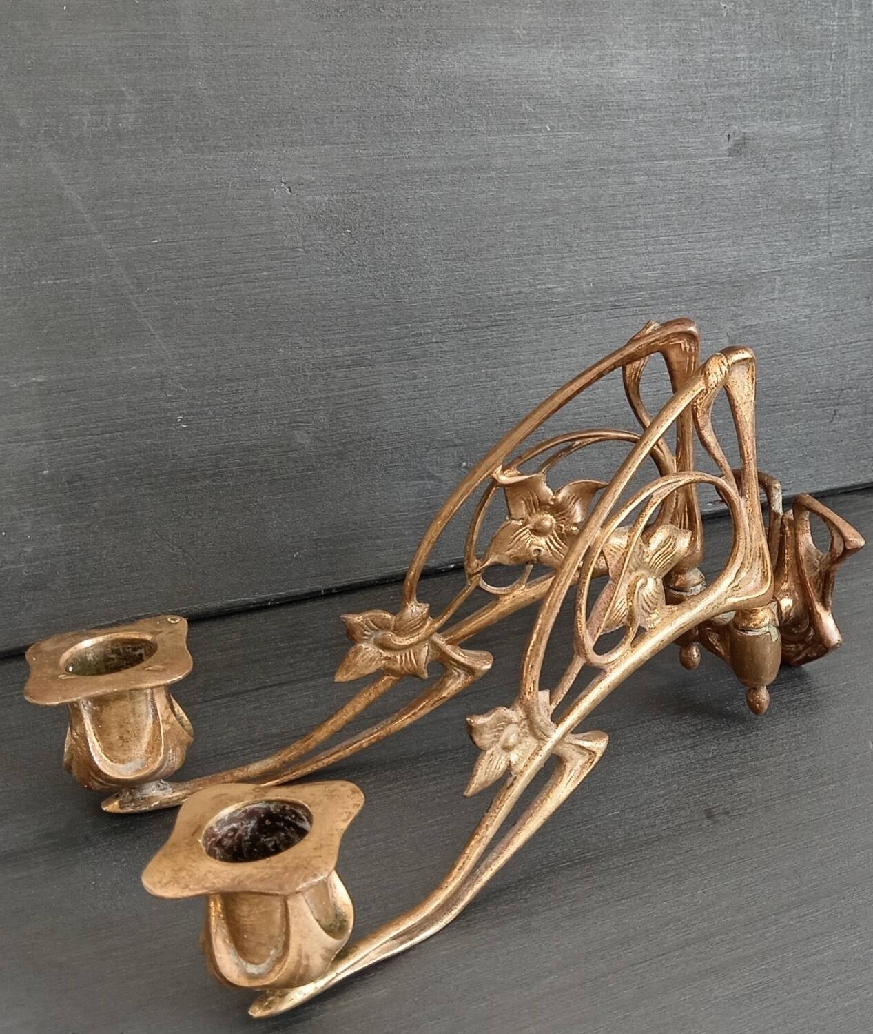 Double candlestick in gilded brass