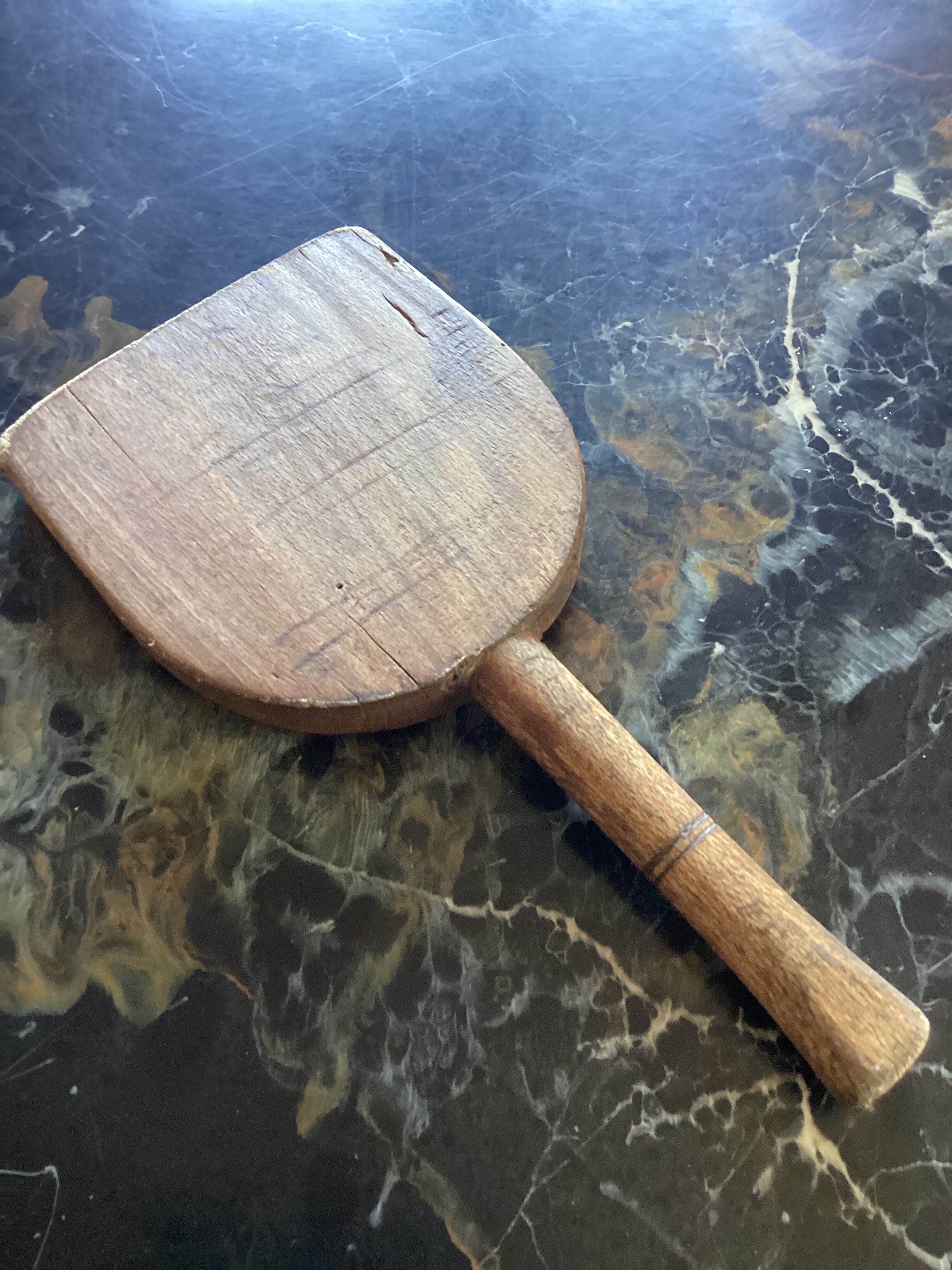 Old wooden clothes beater