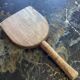 Old wooden clothes beater