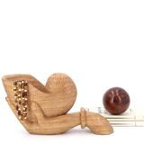 Wooden hand emptier holding a shell, 1970s