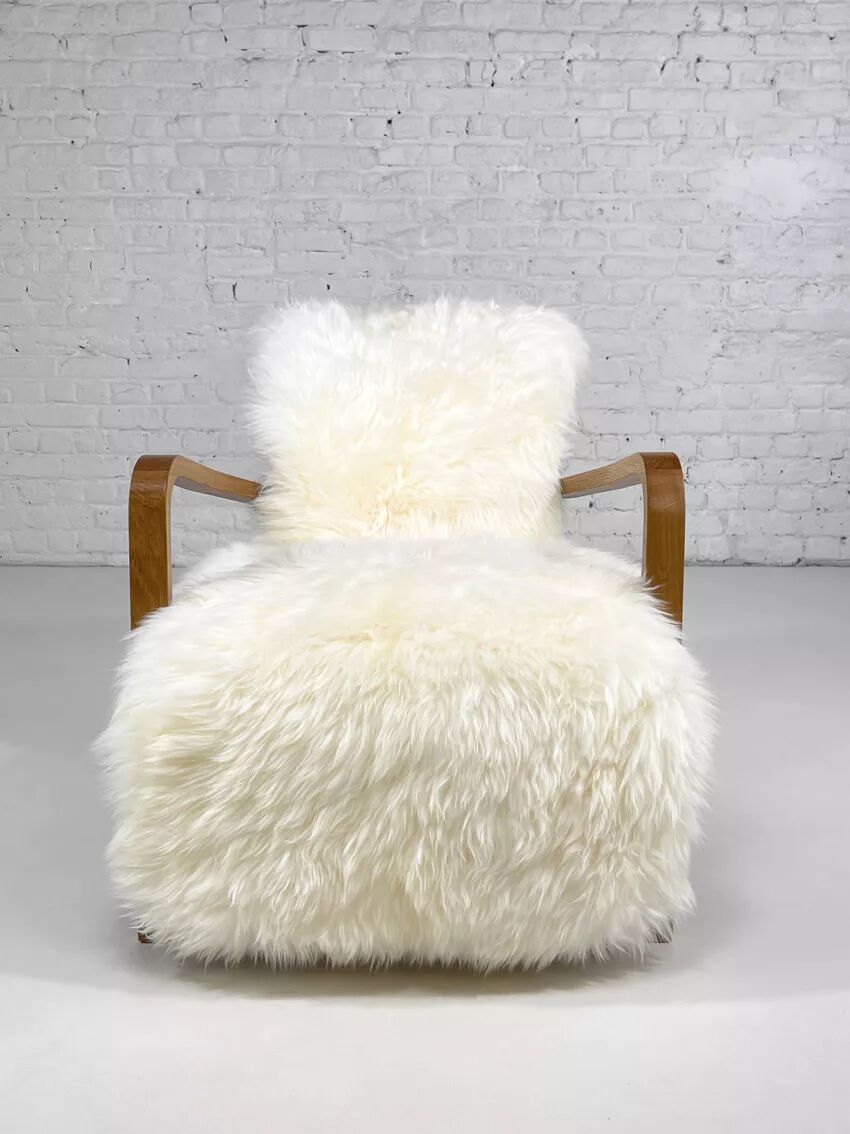 Scandinavian style armchair in leather and hide