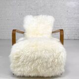 Scandinavian style armchair in leather and hide
