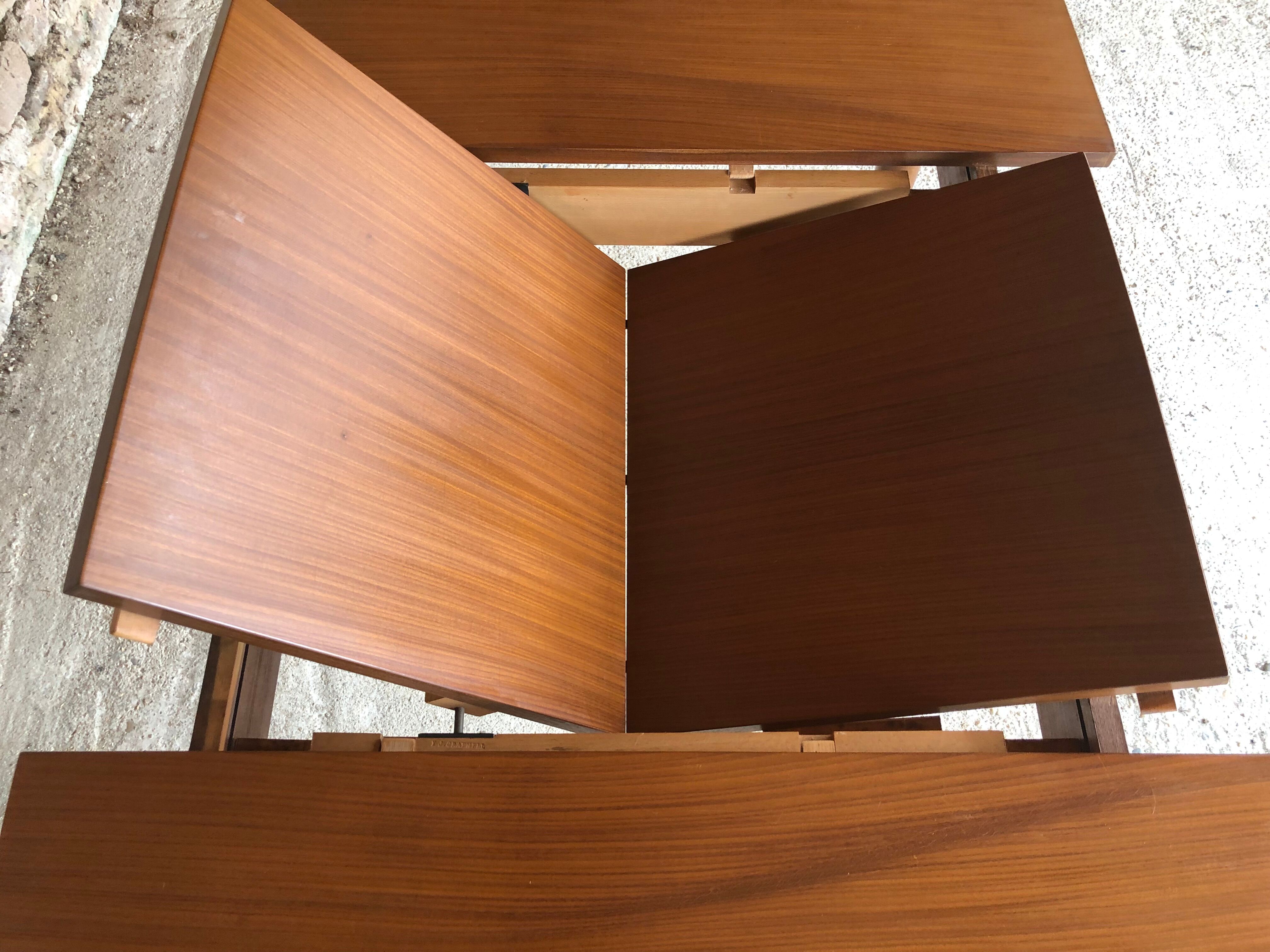 Scandinavian extension teak stretch table in butterfly ephardt by Meredew circa 60's