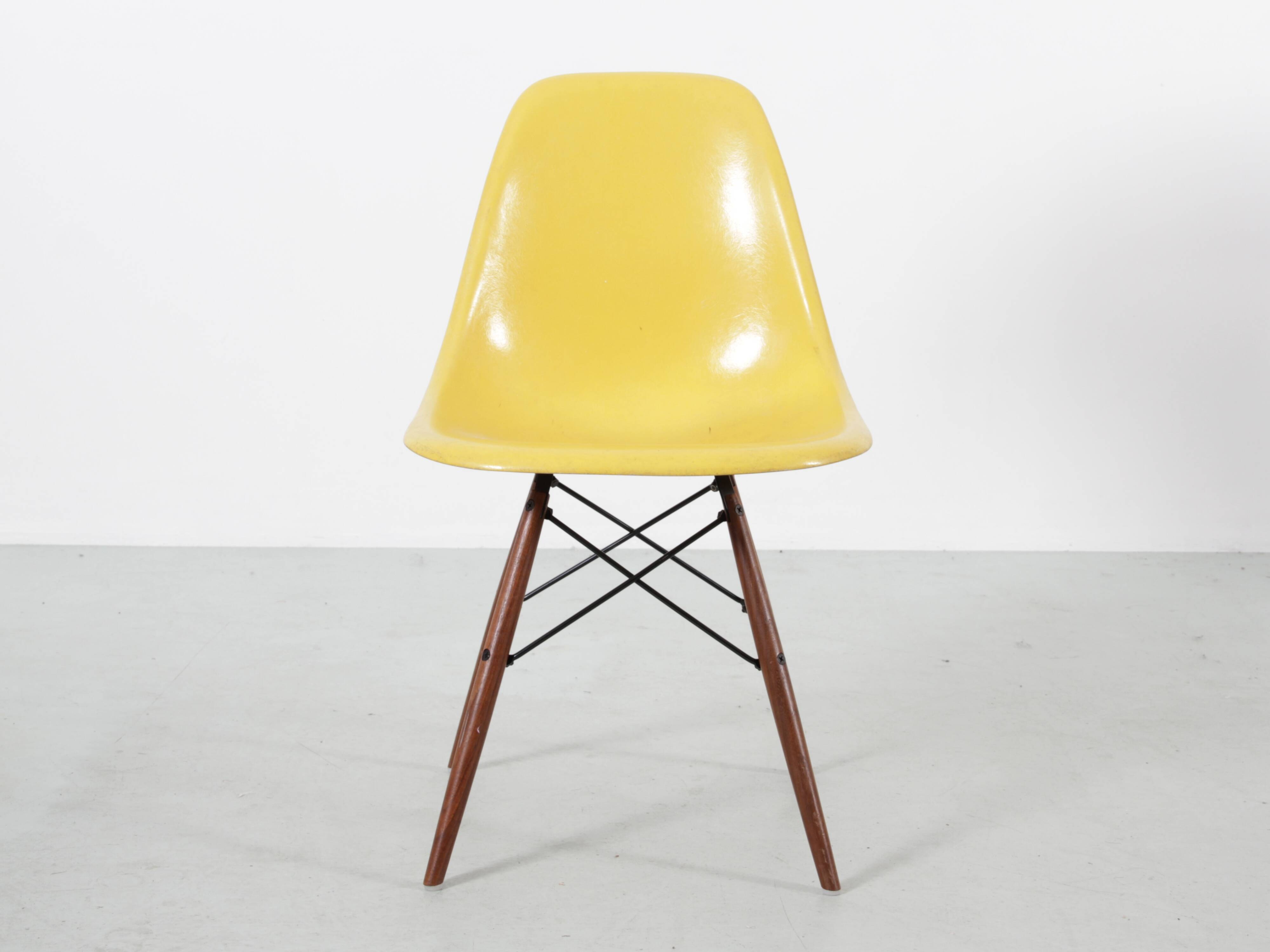Set of 4 DSW chairs by Charles Eames - yellow fibreglass edition by Herman.