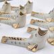 White and gold Limoges porcelain knife rests - animal motif: fish
