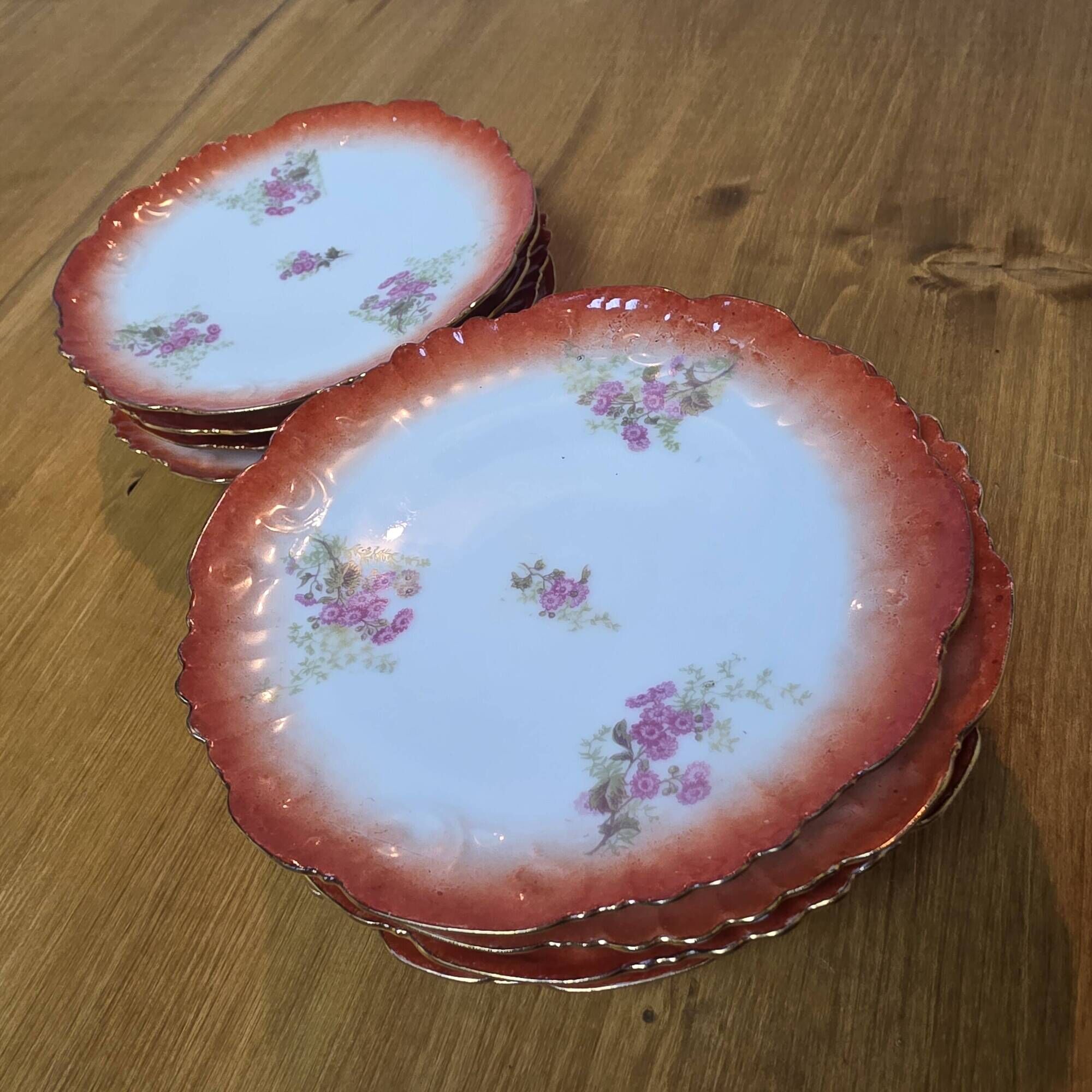 10 scalloped plates in French porcelain