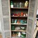 Wooden louvered wardrobe
