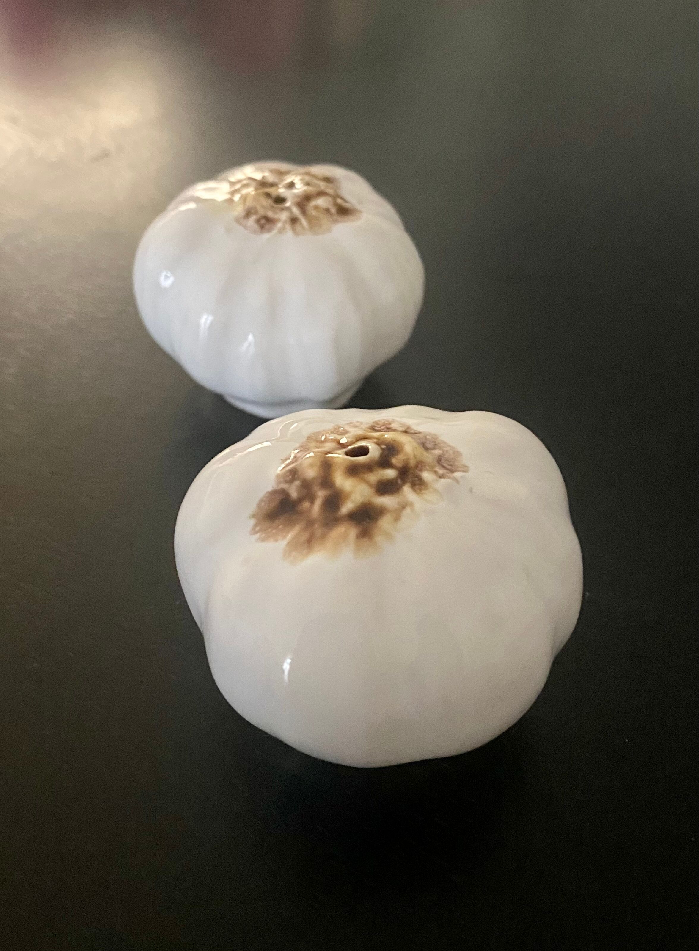 1 salt shaker and 1 pepper white garlic shape