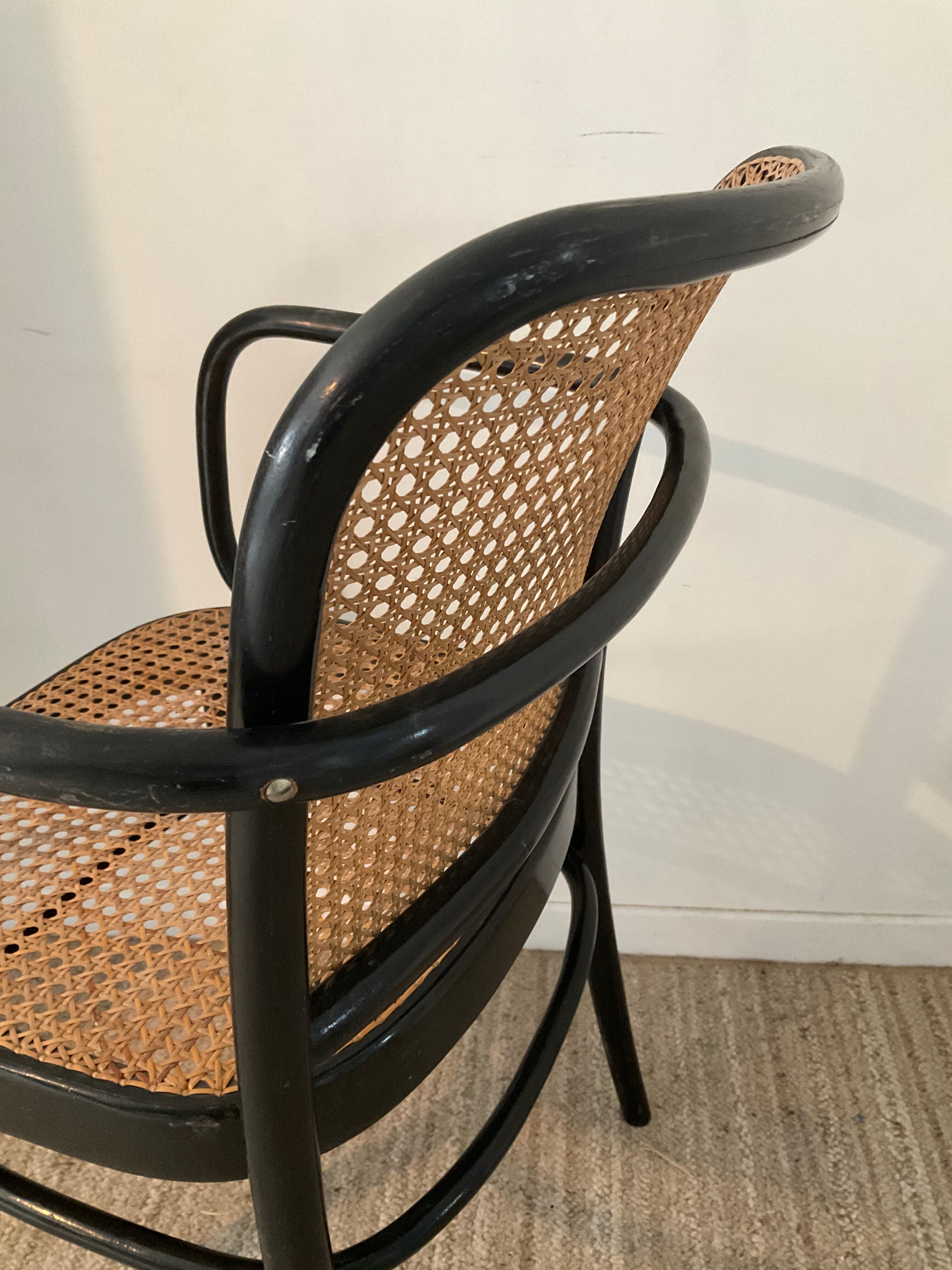 Canned bistro armchair and curved wood from the 60s