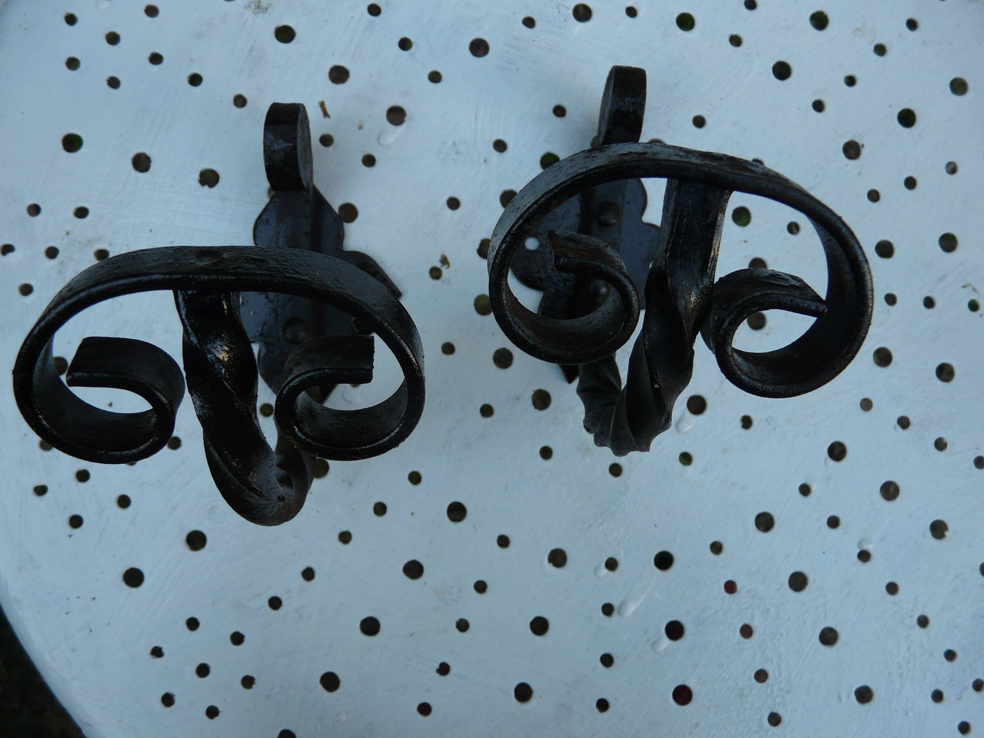 Pair of wrought iron wall hooks