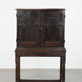 Unique antique English cabinet on stand made of oak from the 17th century