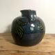 Glazed terracotta round vase