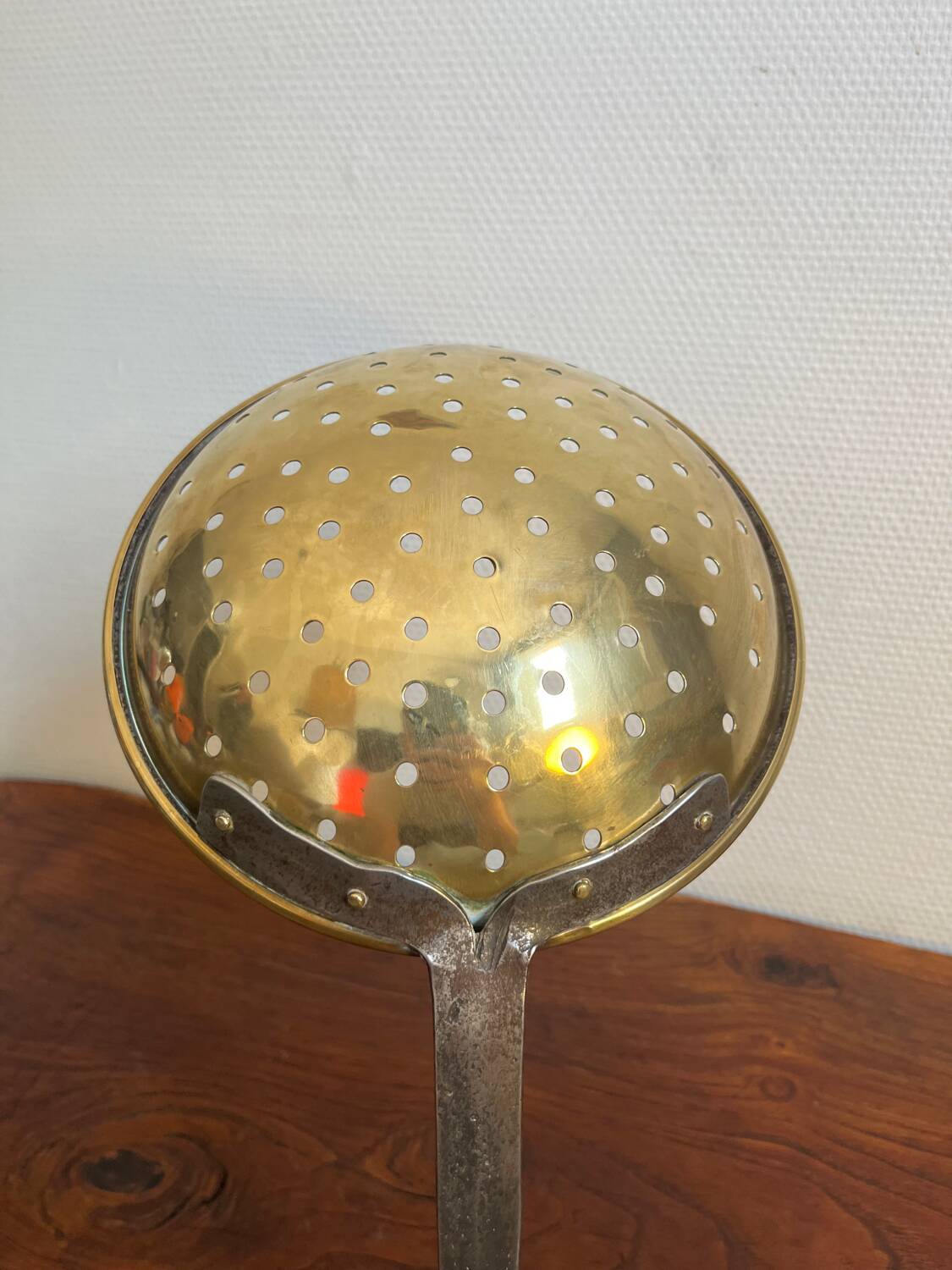 Large skimmer in brass and wrought iron, early 20th century