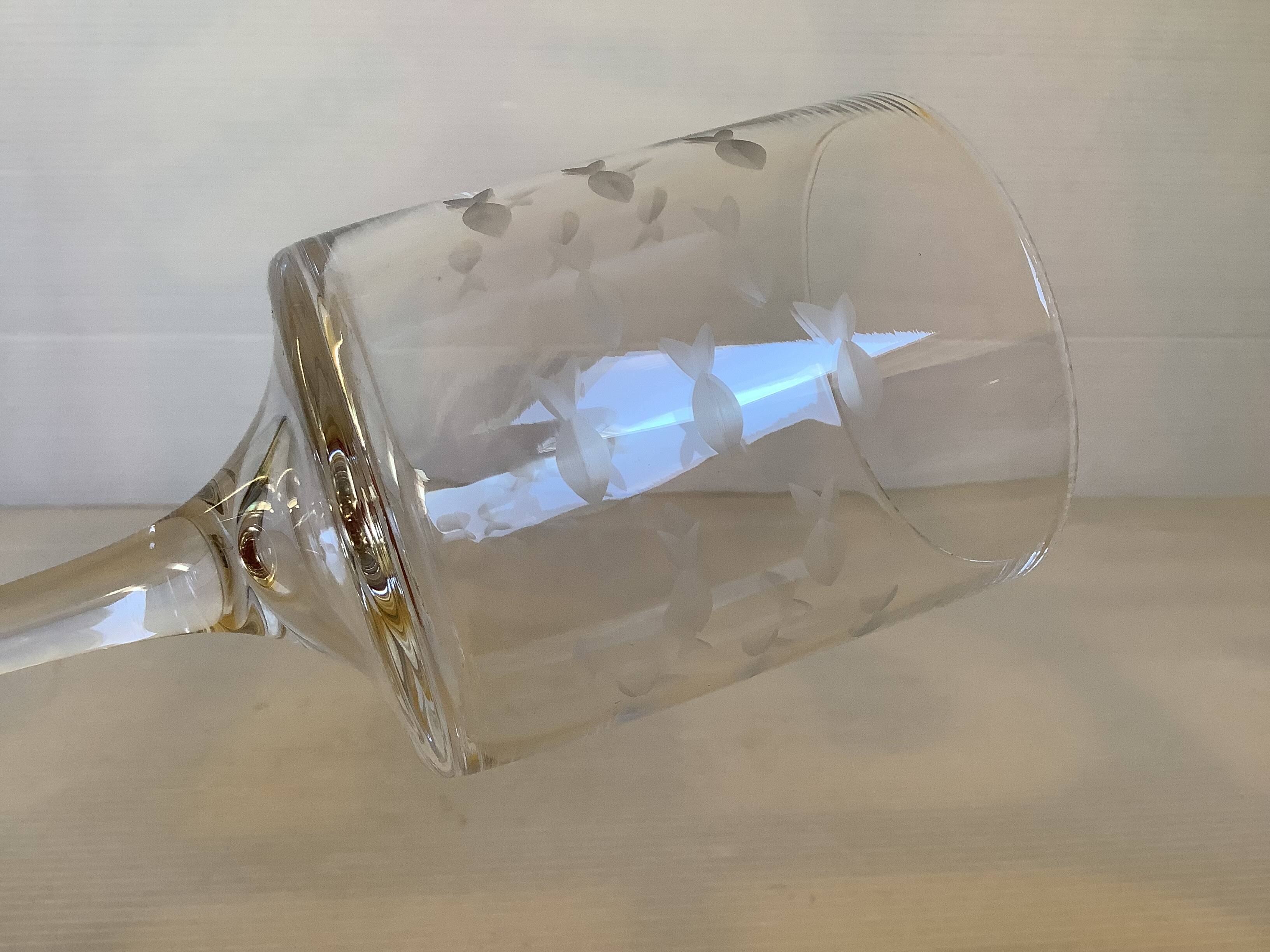 Duo of cut glass fish candle holders