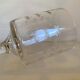 Pair of fish-shaped cut glass candlesticks