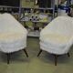 Pair of Mid-Century armchairs in white faux fur with beech legs.