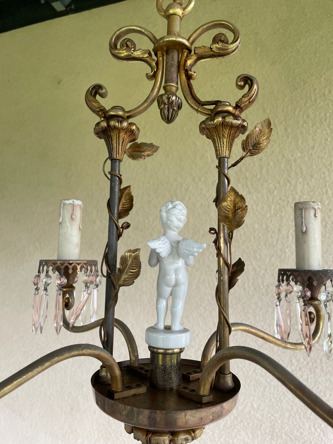 Antique bronze chandelier with porcelain angel.