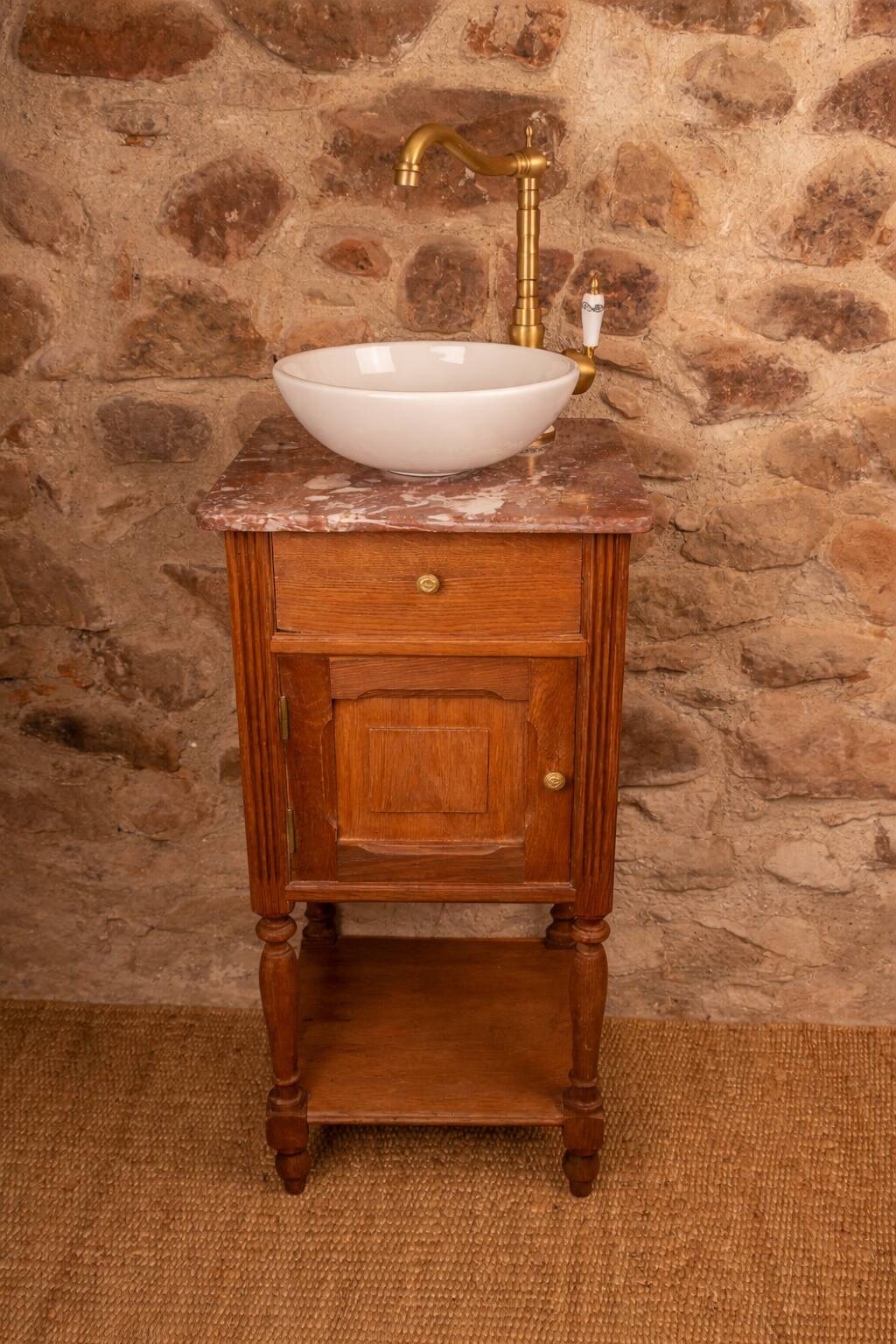 Washbasin made from a bedside table.