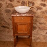 Washbasin made from a bedside table.