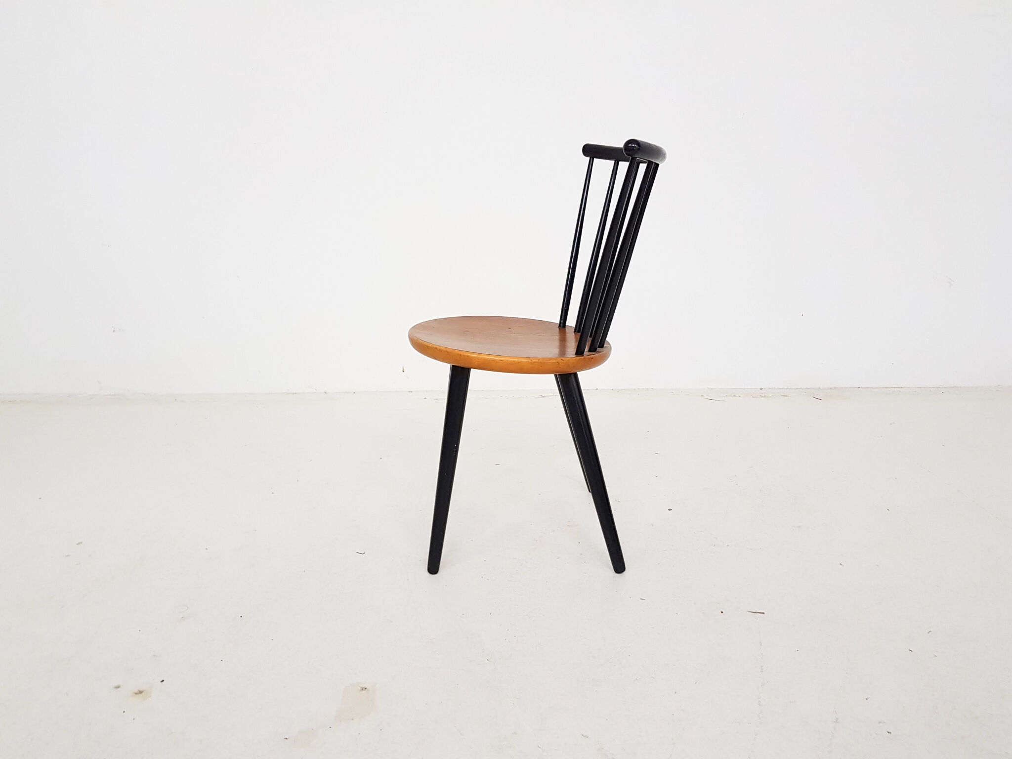 Vintage spindle back chair with round seating