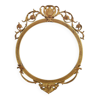 Round brass medallion style mirror