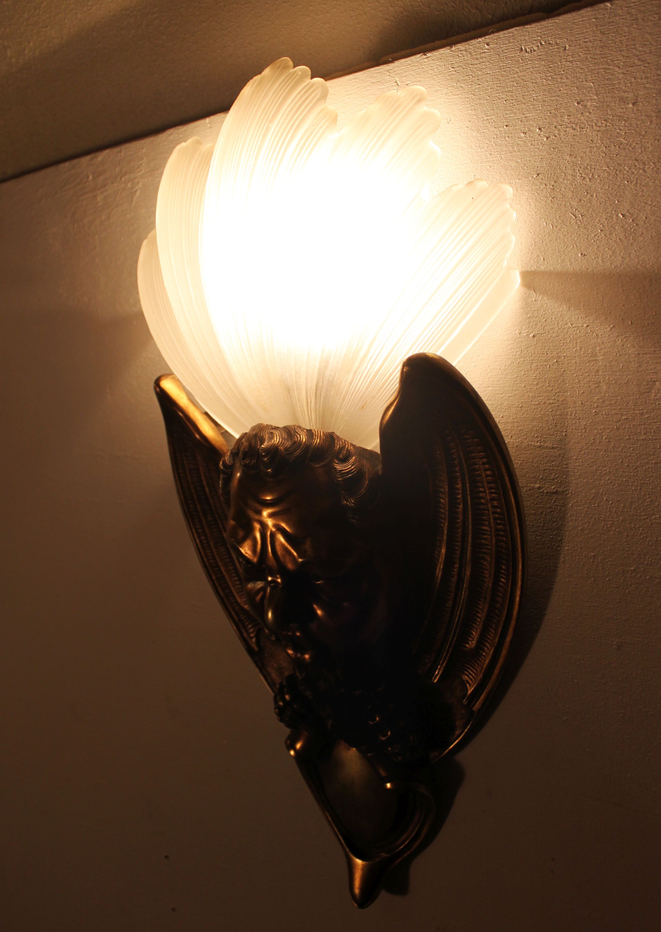 Pair of bronze wall lamps Art Deco style early twentieth century