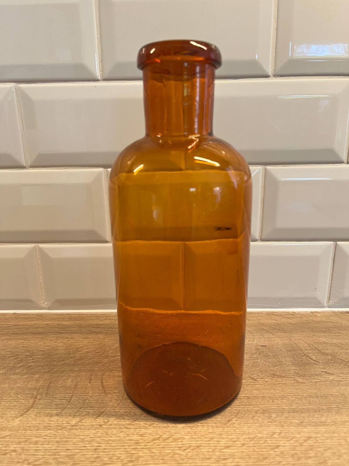 Amber glass bottle vase