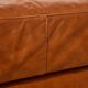 Ottoman with leather upholstery