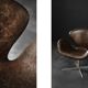 Brown leather Swan chair by Arne Jacobsen, mid-century Danish modernity.