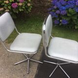 Vintage swivel chairs with chrome tubular base and silver skaï brand unic desing.