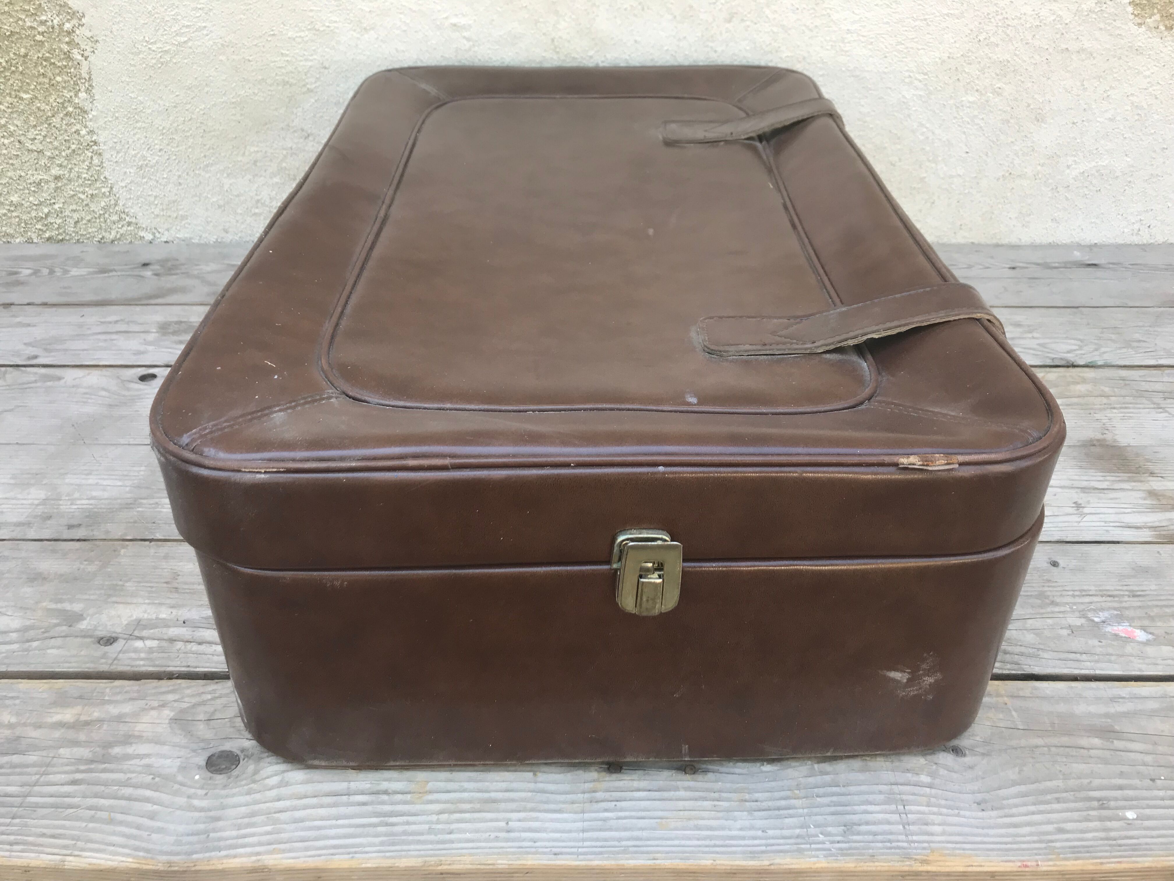 Old suitcase travel leather brown