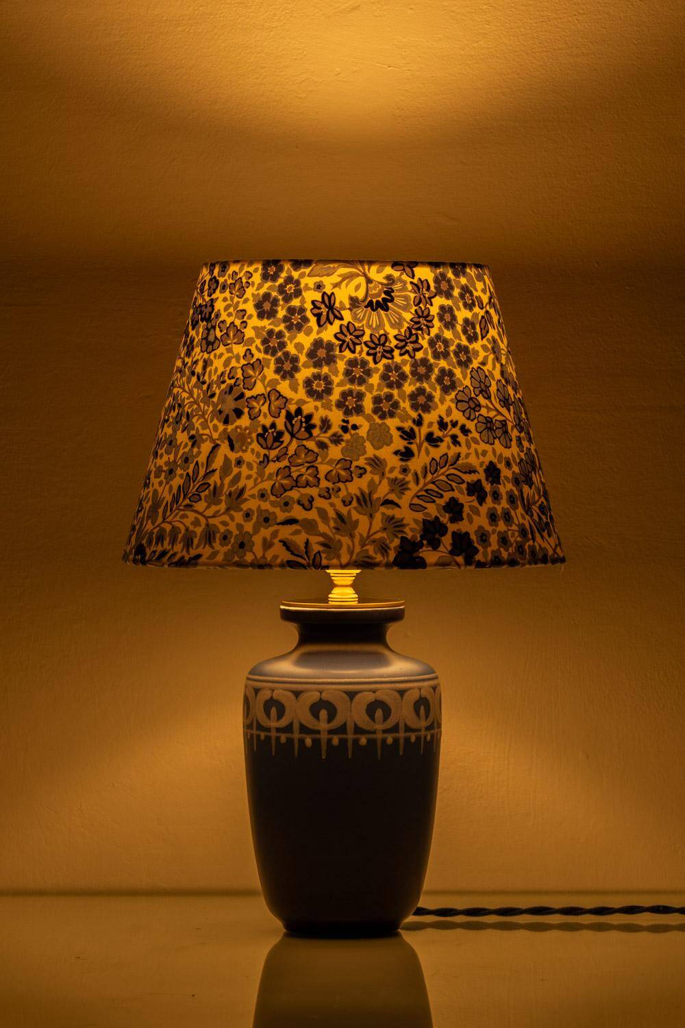 Mid-century modern blue ceramic table lamp with new Liberty London floral shade.