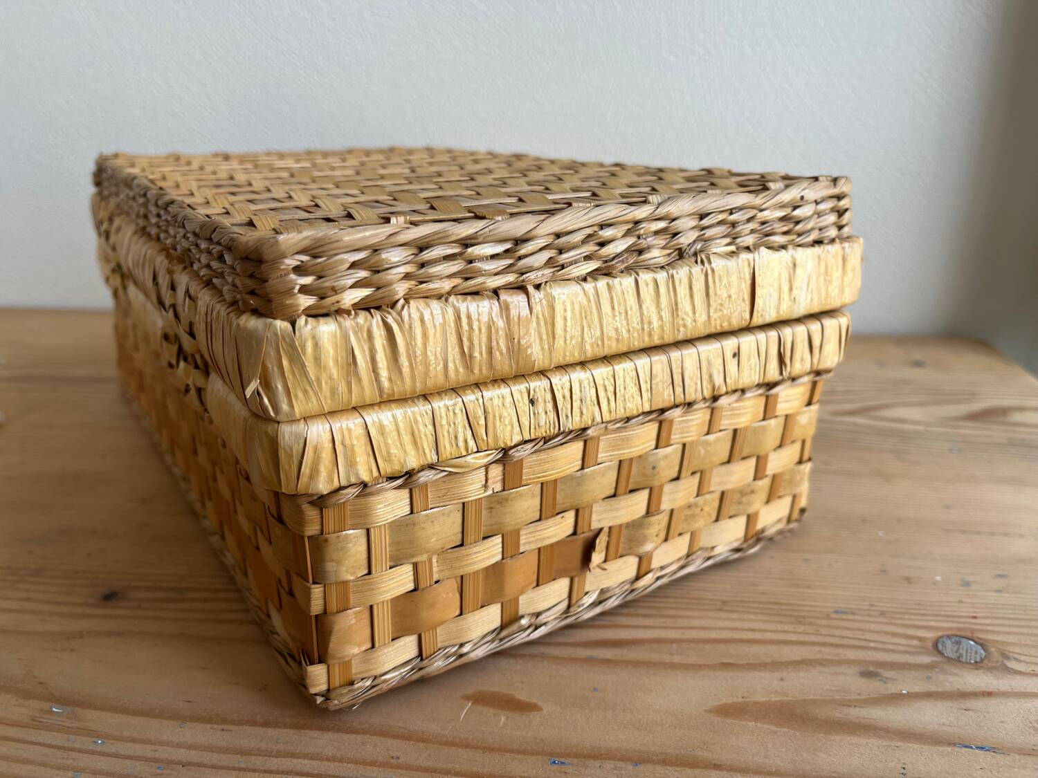 Vintage woven wicker suitcase