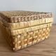 Vintage woven wicker suitcase