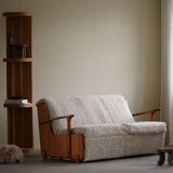 Modern Swedish two-seater independent sofa bed in pine and lambswool, 1950s.