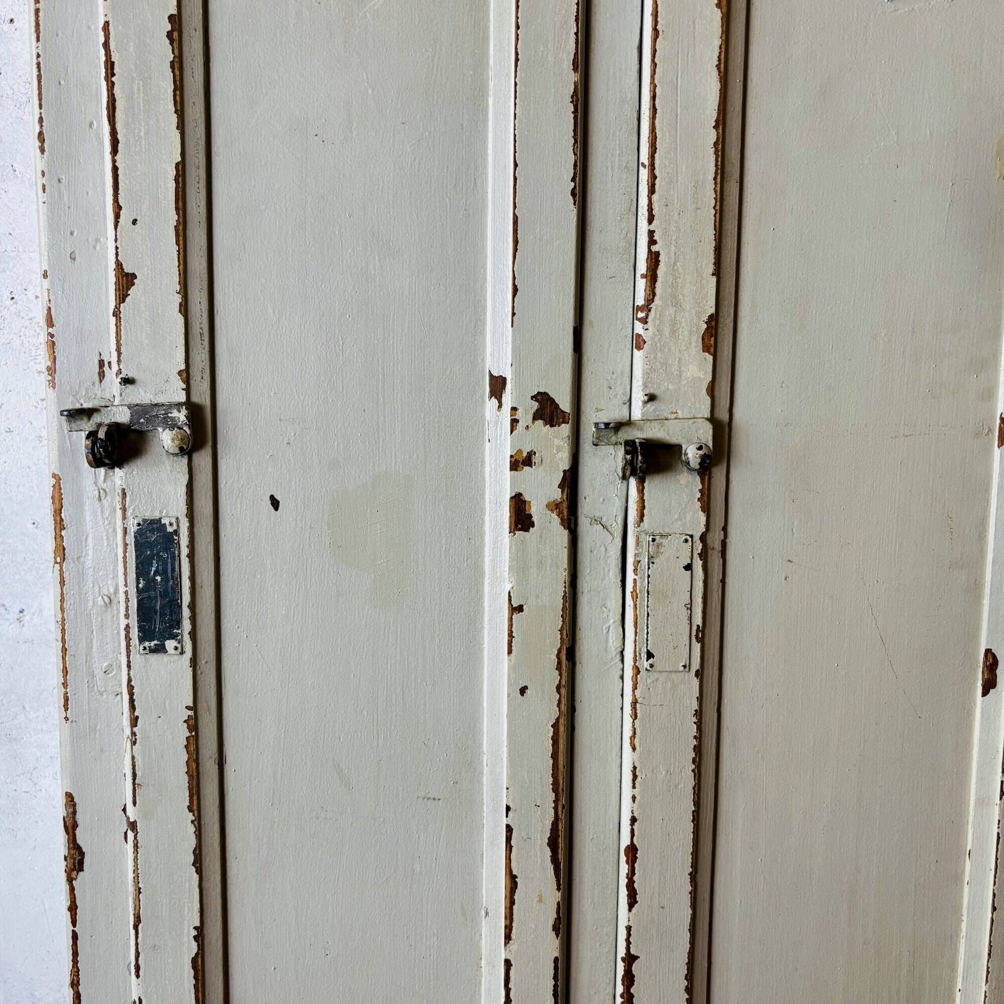 Old factory lacquered pine locker from early 20th century France.