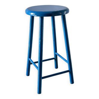 Vintage wooden stool with electric blue paint