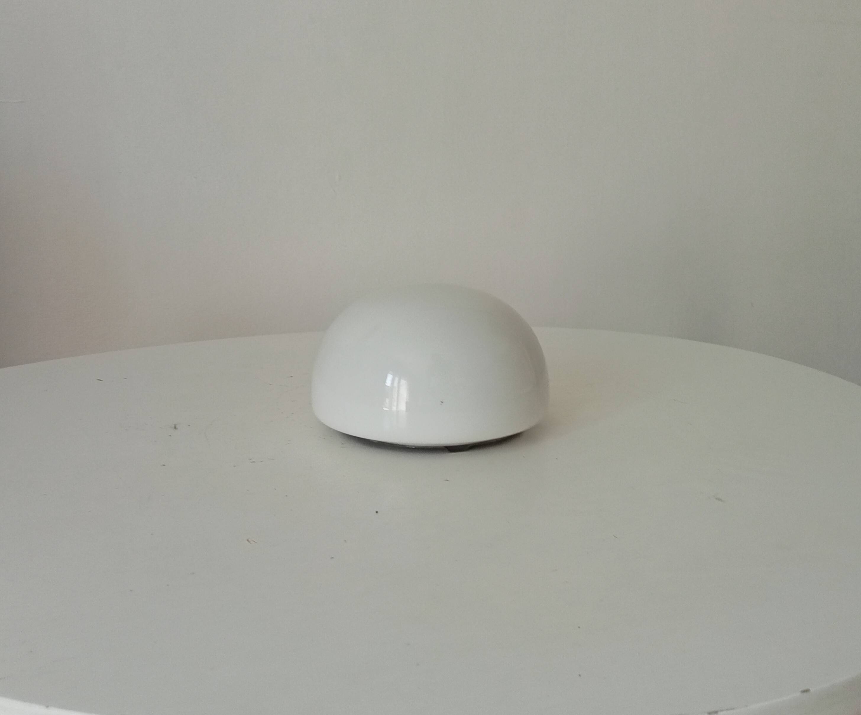 Vintage opaline wall light from the 1960s.