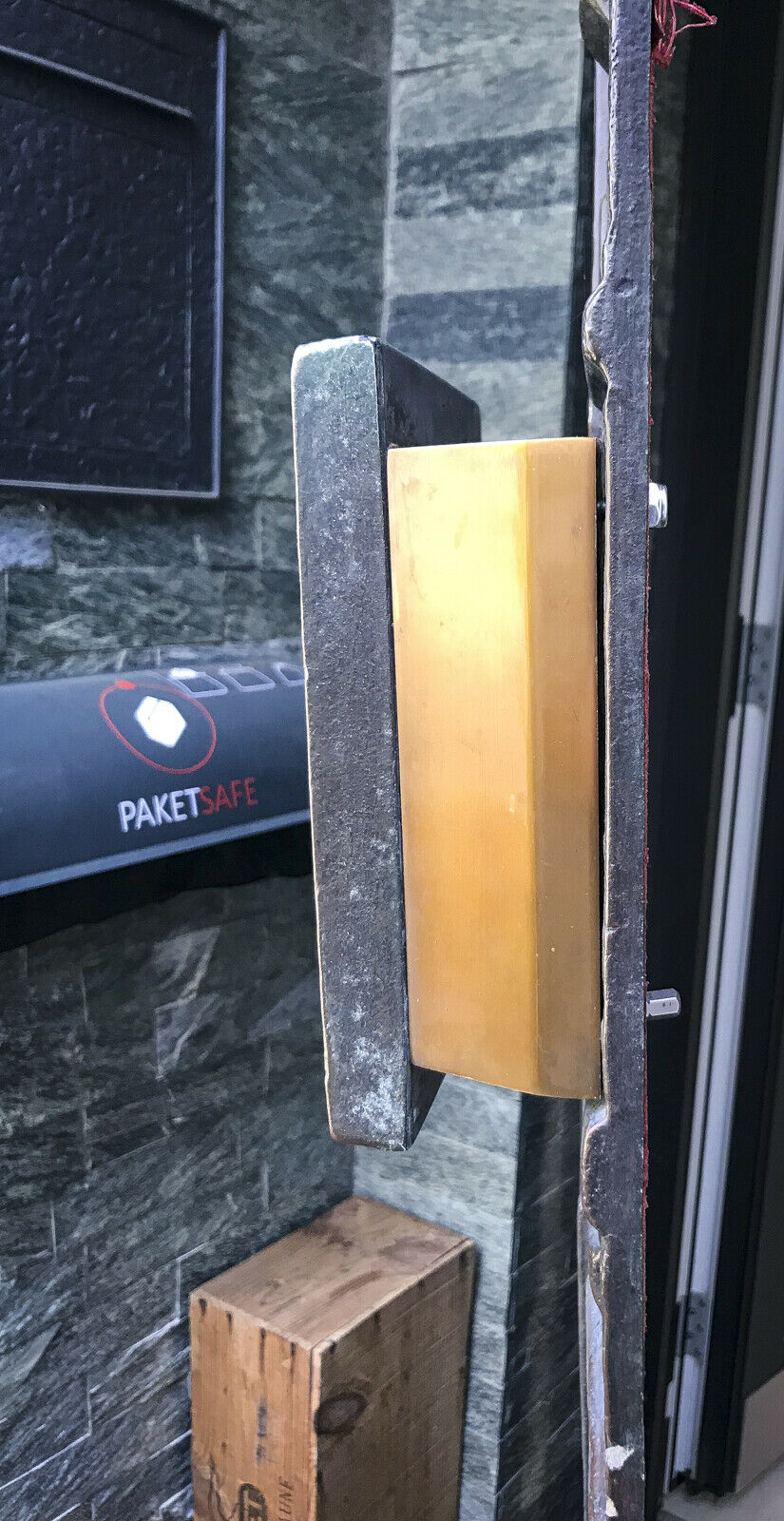Copper brutalist entrance door, 70s architecture
