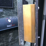 Copper brutalist entrance door, 70s architecture