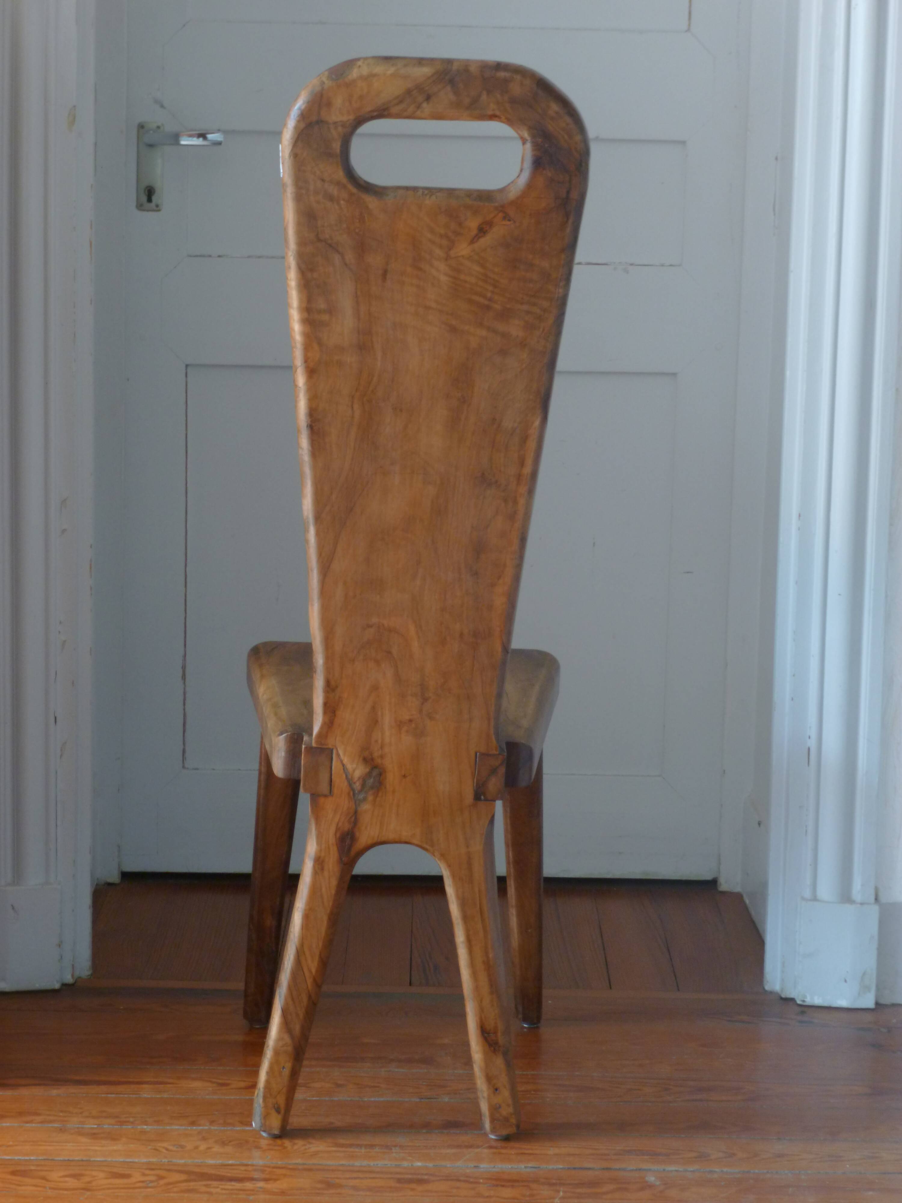 Maison Dubosq, an olive chair, 70s